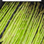 green asparagus in black air fryer with text overlay 