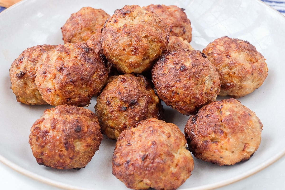 crispy air fried meatballs in white dish