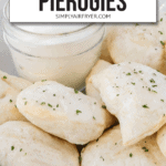 crispy pierogies in bowl with chopped parsley sprinkled on top and jar of sour cream in background plus text overlay saying "crispy air fryer pierogies"