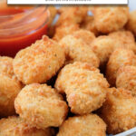 cooked popcorn chicken in bowl with dipping sauce behind and text overlay "air fryer frozen popcorn chicken".