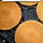 frozen pancakes in black air fryer basket with text overlay 