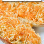 cooked garlic bread with cheese on plate with text overlay 