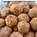 cooked meatballs stacked in bowl with text overlay "frozen meatballs in the air fryer".