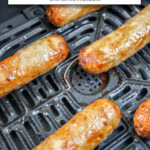 cooked chicken sausage in black air fryer with text overlay 