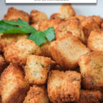 crispy croutons in bowl with text overlay 