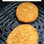 breaded chicken patties in black air fryer with text overlay "frozen chicken patties in the air fryer".