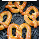 soft pretzels with coarse salt in air fryer with text overlay "frozen soft pretzels in the air fryer".
