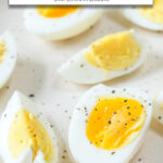 hard-boiled eggs on plate with text overlay 
