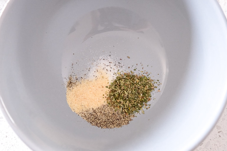 spices in grey bowl ready to be mixed together