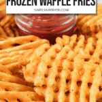cooked waffle fries in bowl with ketchup in the middle and text overlay "air fryer frozen waffle fries"