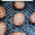 cooked sausage patties in black air fryer with text overlay "sausage patties in the air fryer".
