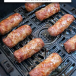 cooked cevapi in black air fryer with text overlay "frozen cevapi in the air fryer".