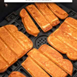 french toast sticks in black air fryer with text overlay "frozen french toast sticks in the air fryer".