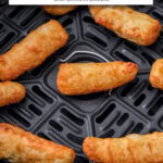 breaded pickles in black air fryer with text overlay "frozen fried pickles in the air fryer".