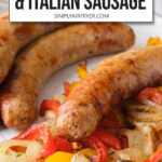 cooked Italian sausages, peppers, and onions on plate with text overlay "air fryer peppers & Italian sausage".