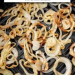 sliced onions in black air fryer basket with text overlay "crispy onions in the air fryer".