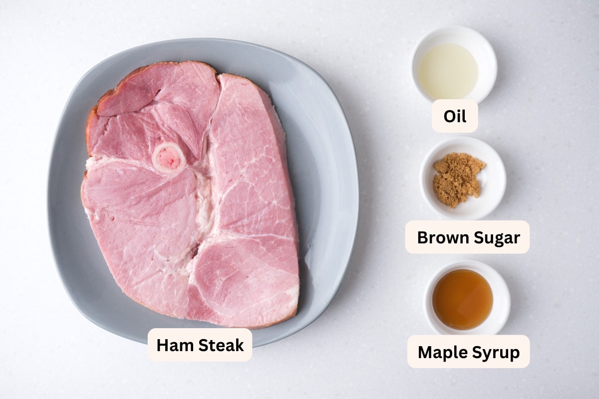 ham steak and other ingredients on white counter top with labels.