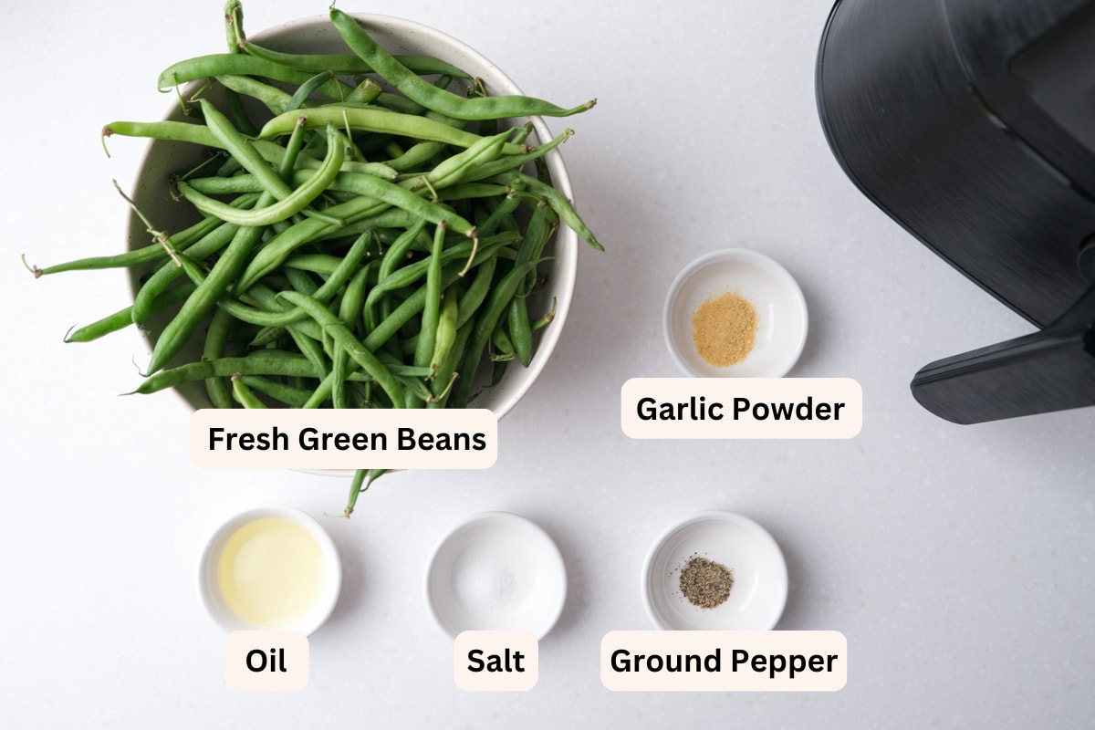 green beans and other seasonings in bowls on counter with labels seen from top down.