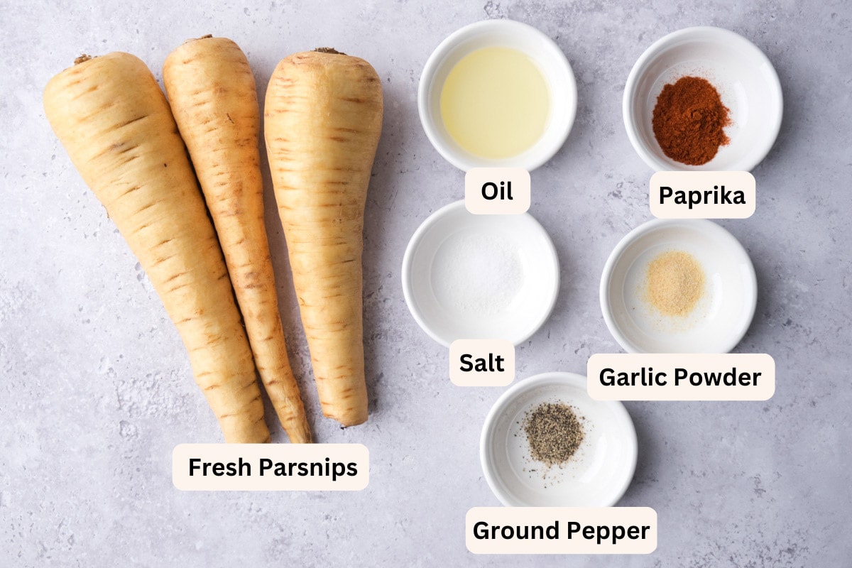 ingredients to make parsnip fries sitting on grey counter with labels.