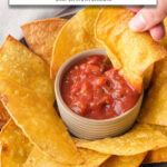 tortilla chips in bowl with salsa in the middle and text overlay "tortilla chips in the air fryer".