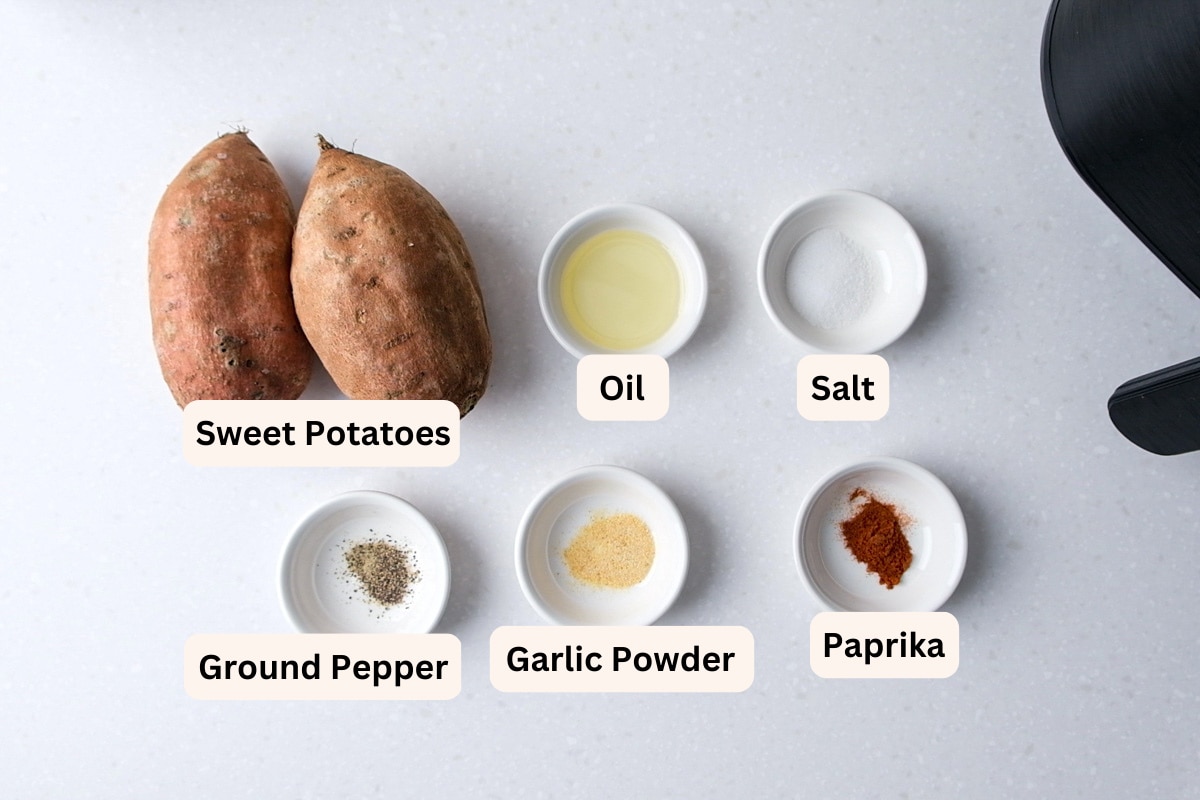 ingredients to make sweet potato fries on counter with labels.