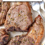 cooked lamb chops on plate with text overlay "lamb chops in the air fryer".