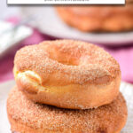 donuts with sugar stacked on plate with text overay "homemade donuts in the air fryer".