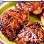 crispy bbq chicken thighs on plate with text overlay "bbq chicken thighs in the air fryer".