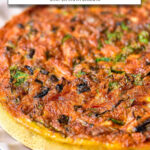 cooked frittata on plate with text overlay "easy frittata in the air fryer".