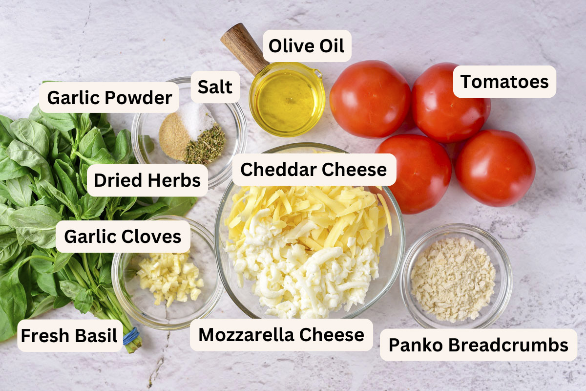 ingredients to make stuffed tomatoes on counter in bowls with labels beside.