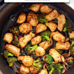 pieces of cooked chicken and broccoli in black air fryer with text overlay "chicken & broccoli in the air fryer".