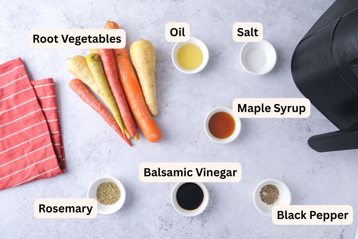 ingredients to make roasted root vegetables in bowls on counter with labels.