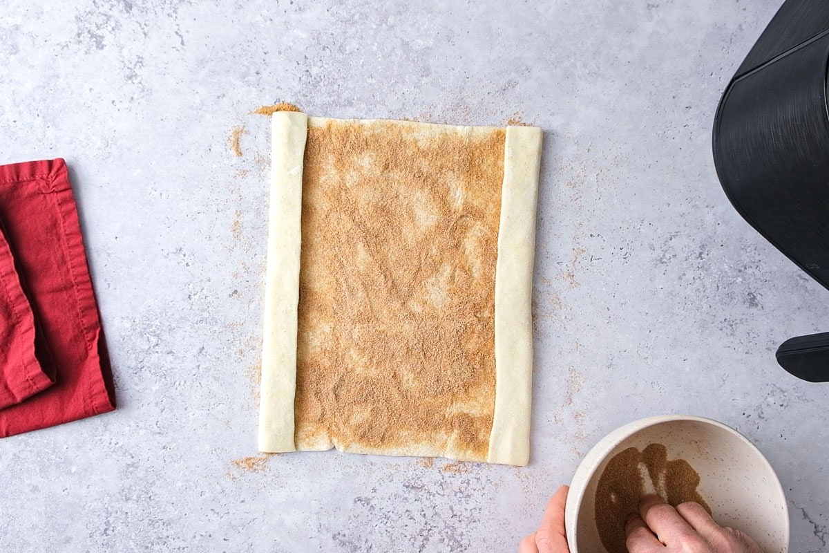 puff pastry on counter with edges folded over.
