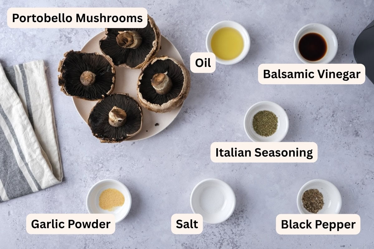 ingredients to make air fryer portobello mushrooms on counter with labels.
